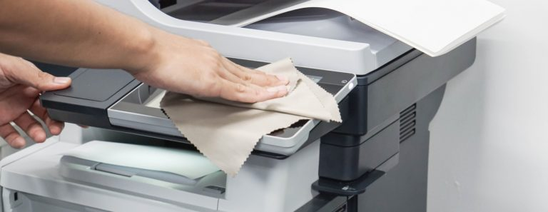 Vệ sinh máy sạch sẽ là cách khắc phục bản in xám nền