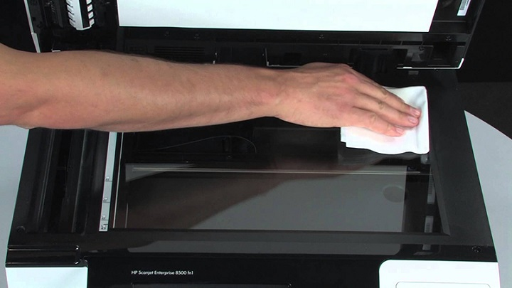 vệ sinh gương trong máy photocopy