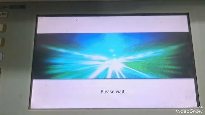 máy ricoh báo please wait