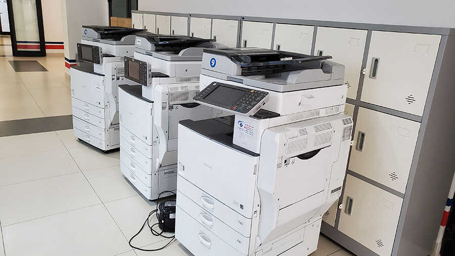 nên mua máy photocopy loại nào để kinh doanh 2