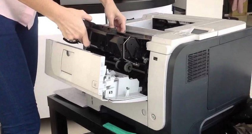 khắc phục máy in bị đen giấy